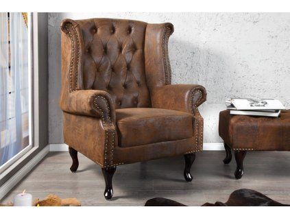 Luxusní hnědé křeslo Chesterfield ušák