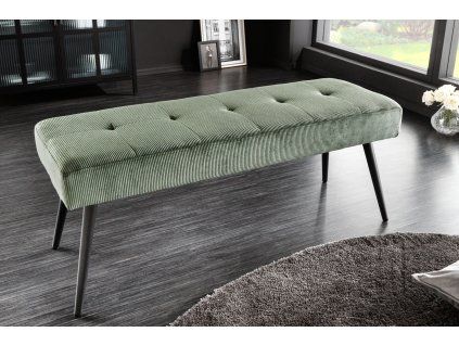 Designová čalouněná lavice v zelené barvě v interiéru